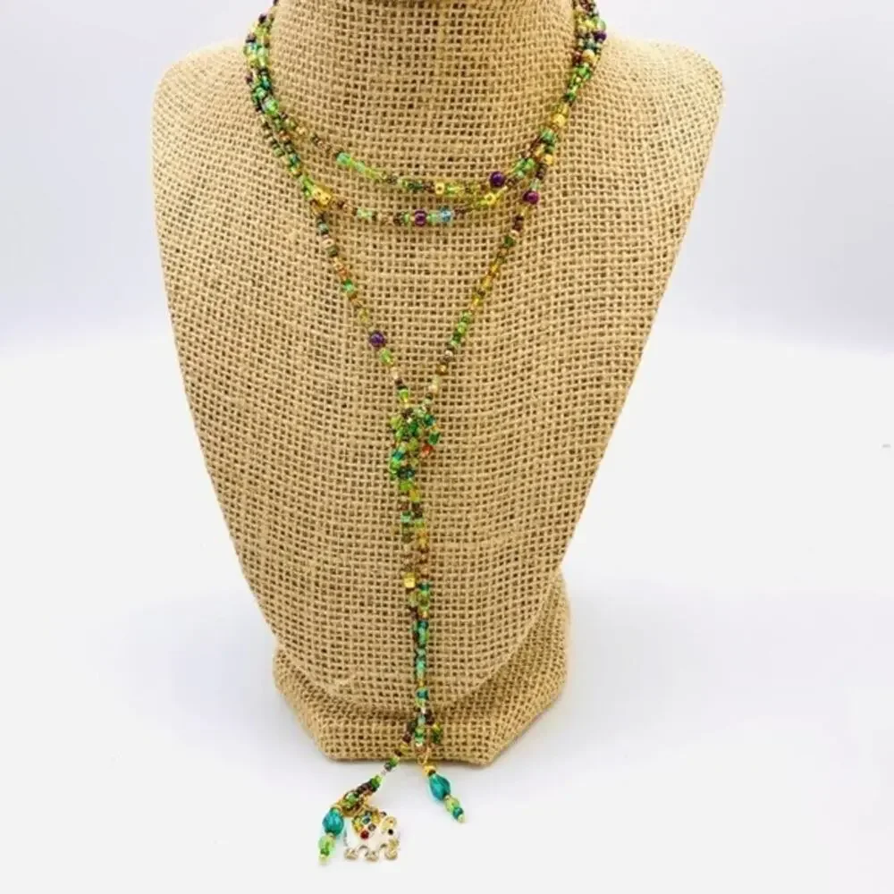 55” lariat. Handmade multicolor green brown beads